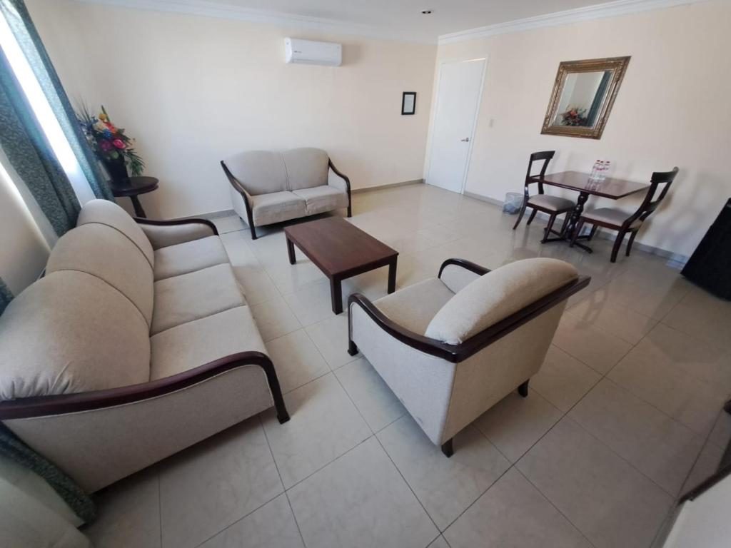 Shared lounge at Hotel Confort Plaza